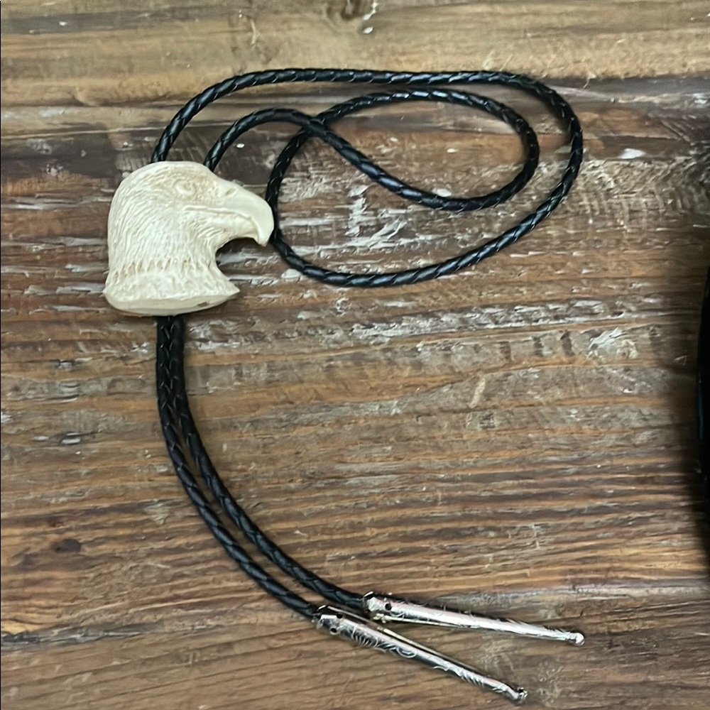 Bone carved Eagle Head Bolo Tie with Black Cord